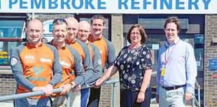 3 Peaks Challengers thank refinery for charity support