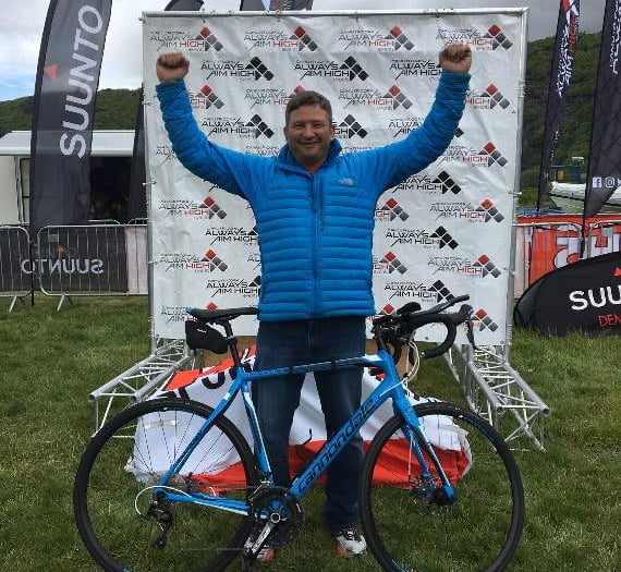 Derek runs six triathlons and an IRONMAN to help save lives across Wales