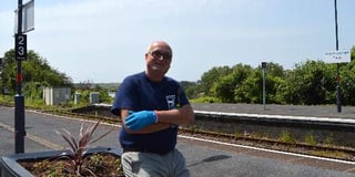 John gets on board with Tenby train station adoption scheme