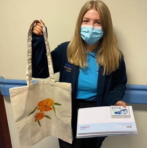 Pictured with some of the bereavement items is Honey Owens, Patient Experience Apprentice