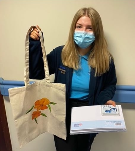 Pictured with some of the bereavement items is Honey Owens, Patient Experience Apprentice