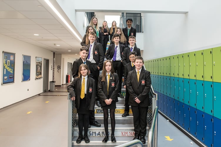Improvements at Ysgol Harri Tudur / Henry Tudor School have been recognised by inspectors.