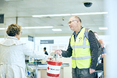 Red Cross charity collector