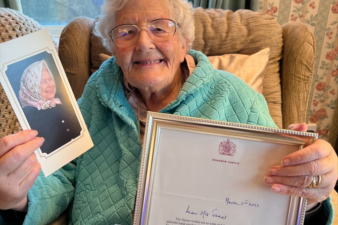 Betty James with her letter from the Queen