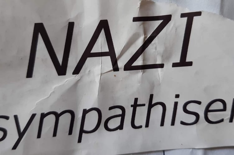 The offensive note left during the vandalism of Ukraine flags in Hermon, near Crymych