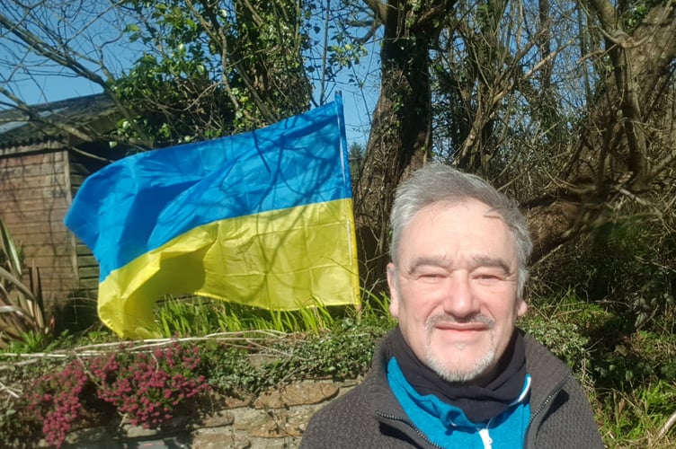Chris Tomos with Ukraine flag