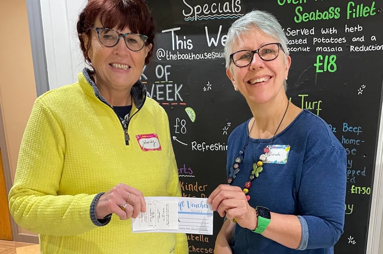 Voucher winner Wendy Morse (left) with Sarah Whiddett, Saundersfoot Connect.