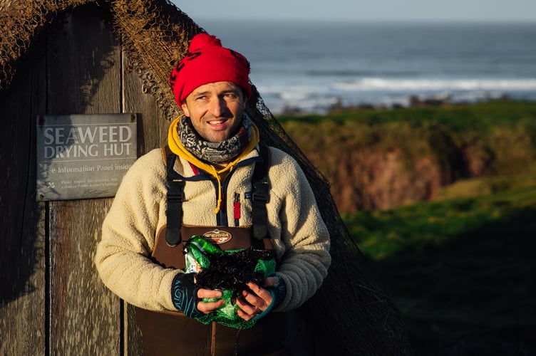Jonathan Williams pictured by the seaweed drying hut in Freshwater West