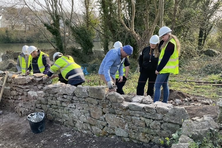 Training future stone masons to restore Pembroke town walls
