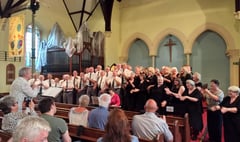 Two choirs share the stage at St. Johns