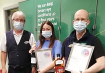 Long service celebrations for Haverfordwest optical duo