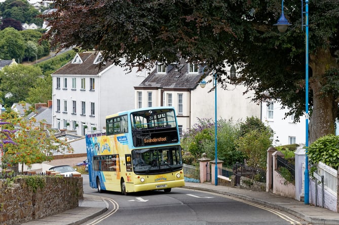 Pictured: The Cymru Coaster travels in Saundersfoot, Wales, UK. Wednesday 20 July 2022
Re: First Cymru Coaster open top double decker bus in Pembrokeshire, Wales, UK.