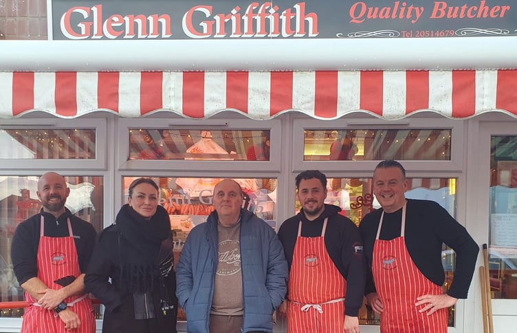 Nathan and Nadiia collecting their New Year duck, donated by Glenn Griffith Quality Butcher