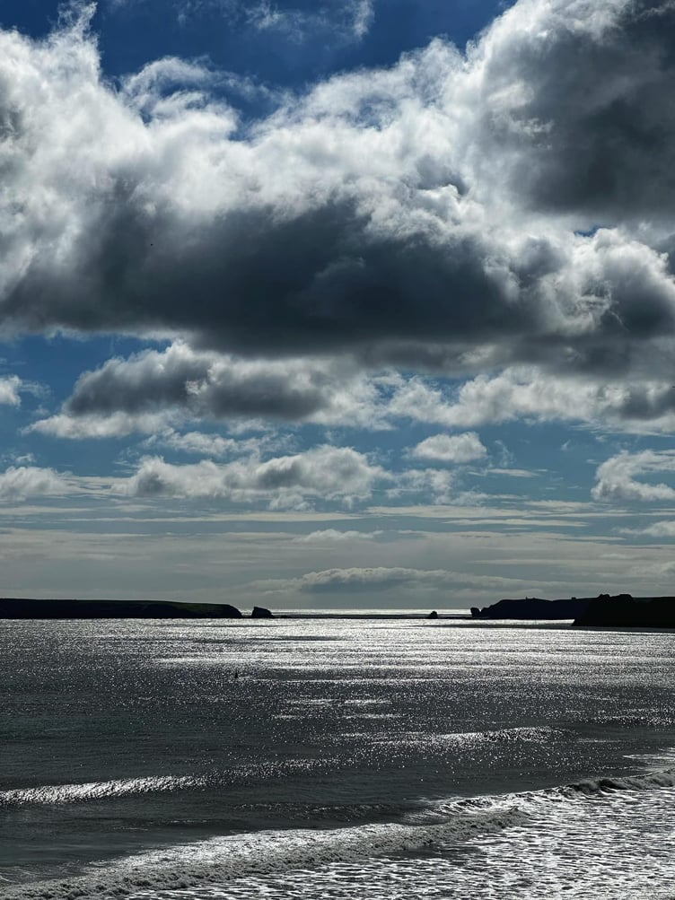At last the sun breaks through and blue skies appear over Giltar Point after a miserably wet Saturday morning