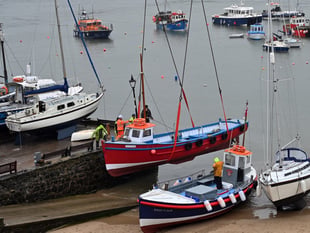 Tenby harbour prepares for annual boat lift-in
