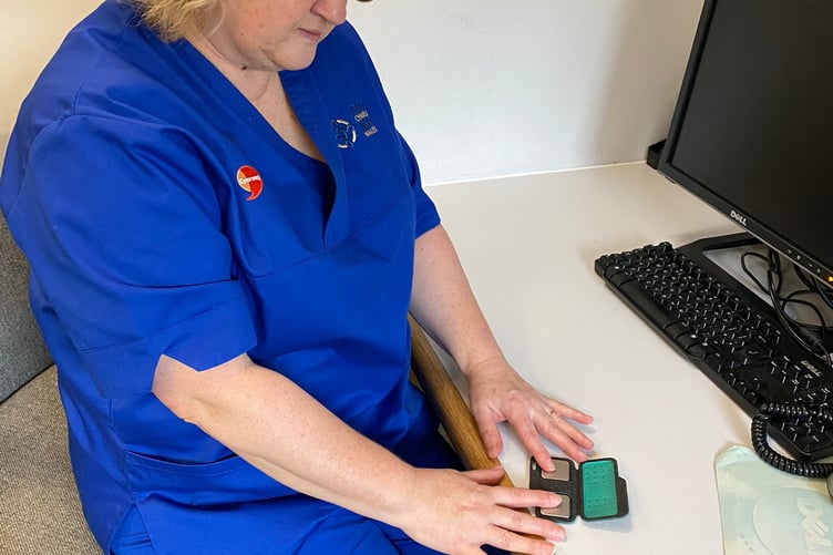 Jenny Matthews, Advanced Nurse Practitioner for Community Cardiology, is pictured with one of the devices