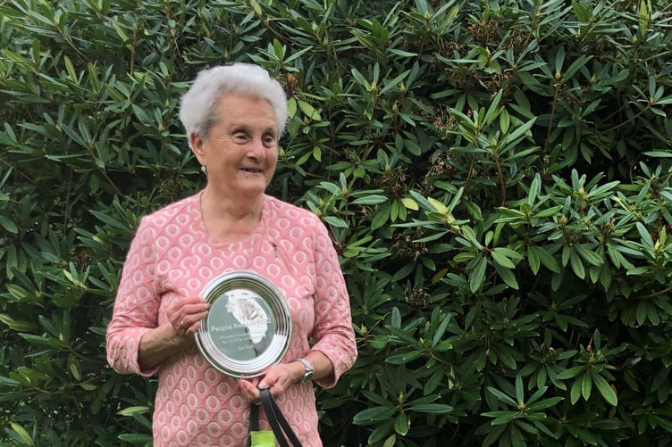 Eva Rich - and guide dog Nancy - pictured in November 2022 on receiving the Princess Alexandra Award for Lifetime Achievement.