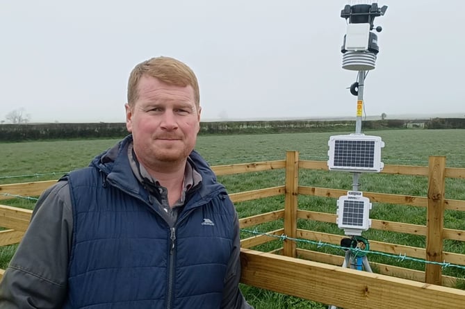 Michael Williams with the new weather station at Fagwr Fran East Farm in Pembrokeshire