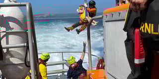 Two lives saved after children get in trouble in surf off Pendine