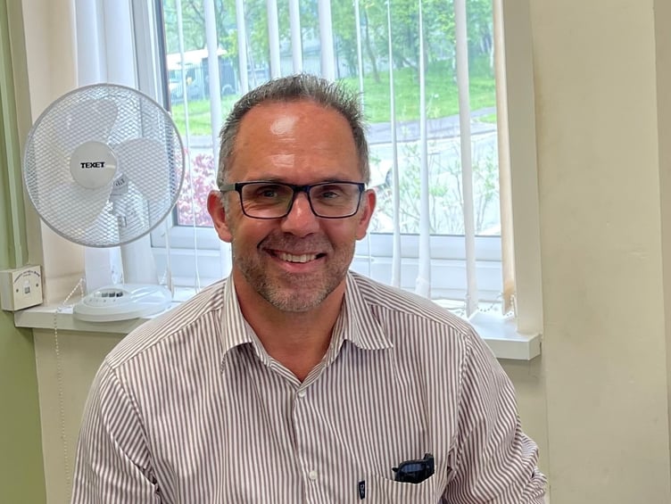 Simon Webster in the Ashmole & Co Swansea office