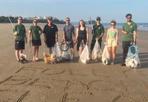 Folly Farm team cleans up Tenby South Beach for World Refill Day