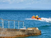 Tenby RNLI rescue two cut off by tide near Monkstone