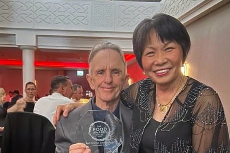 Greg and Kim of Lotus Pendine at the Food Awards Wales 2023 with their Best Oriental Establishment award.