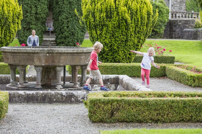 Visitors in the garden at Dinefwr, Carmarthenshire.