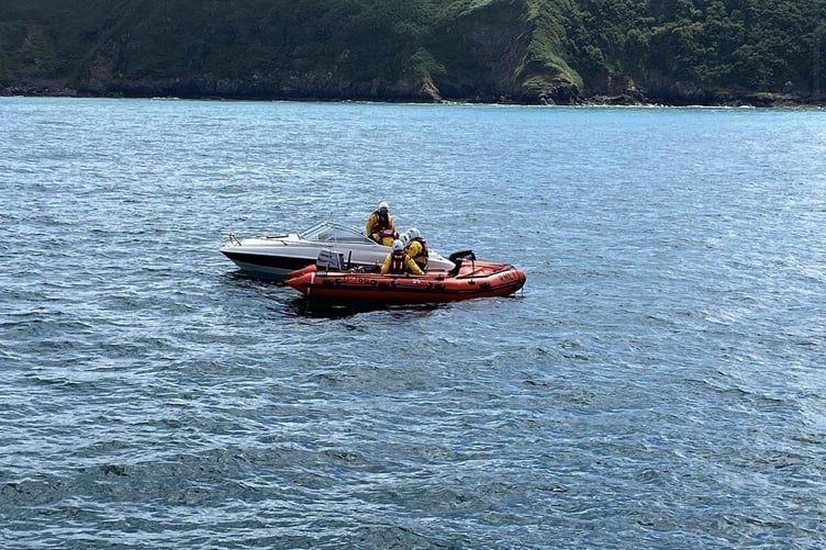 Little Haven D Class pictured with the broken down speedboat  Credit: RNLI St Davids