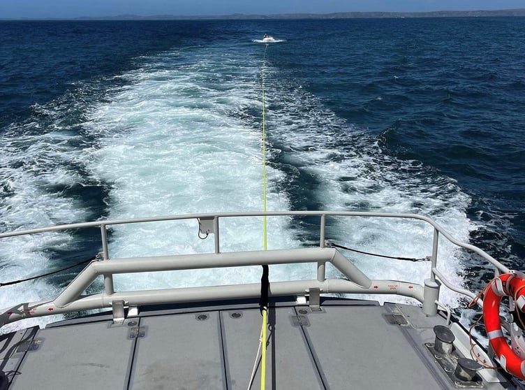 St Davids' Tamar towing the speedboat to safety  Credit: RNLI St Davids