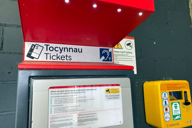 Ticket machine and defibrillator at Tenby Railway Station