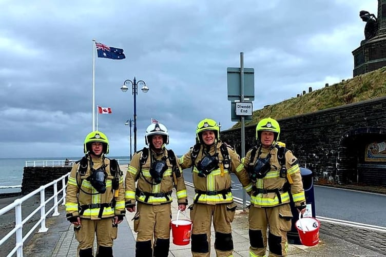 Carwyn, Dewi and Tom from Aberystwyth Fire Station and Owain from Carmarthen Fire Station get ready for their marathon fundraiser challenge