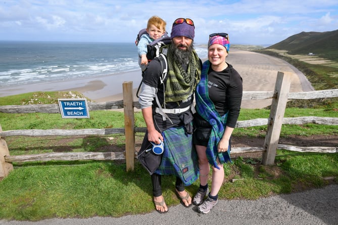 Former paratrooper Chris Lewis who has spent the past 6 years walking the coastline of the UK to raise money for SSAFA - so far raising over Â£500,000. The 19,000 mile walk has taken him on an epic 6-year journey that has seen him meet his partner, Kate and they now have a baby named Magnus. On Saturday he completes his walk where he started, at Llangennith Beach, where heâll be greeted by supporters, local dignitaries and SSAFA CEO, Sir Andrew Gregory. Image licence owned by SSAFACopyright Â© 2023 by Adrian White For permission to publish - contact mevia www.adrianwhitephotography.co.ukPlease respect copyright laws.