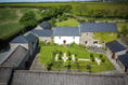 Period barn conversion for sale comes with Flower Show-worthy garden