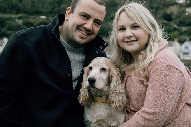 Husband Mike, Maisy the dog and Abbie. See SWNS story SWMRtumour. A woman whose periods suddenly stopped as a teen discovered it was due to a brain tumour. Abbie Few, 29, started what she thought was regular menstruation for two months when she was 13. But her periods then stopped entirely for nearly seven years. Doctors told her to take paracetamol for her headaches and eat more to help promote regular menstruation. 