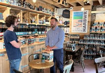 Senedd Member raises a glass to success of Tenby brewery