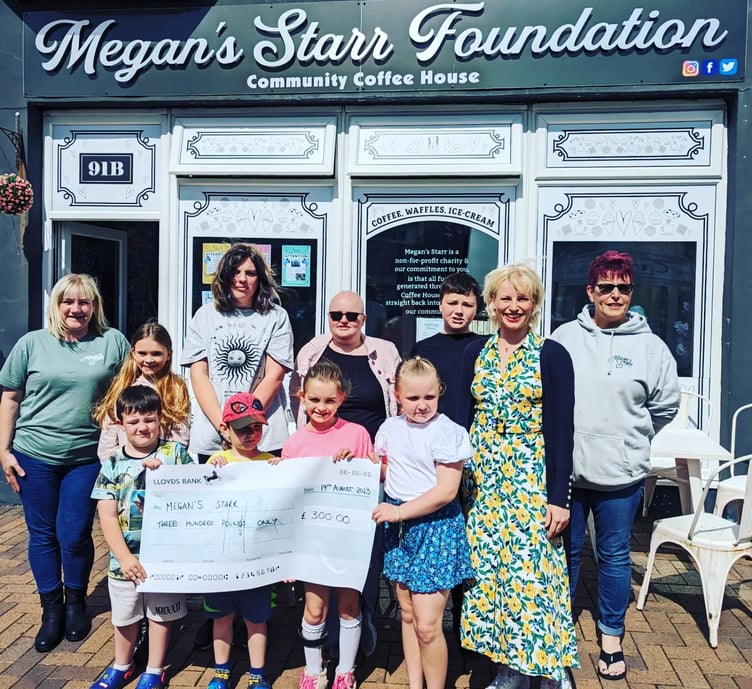 Saturday School students came together to officially hand over the £300 raised for the Megans Starr Foundation in their show at the Torch Theatre earlier this year.
