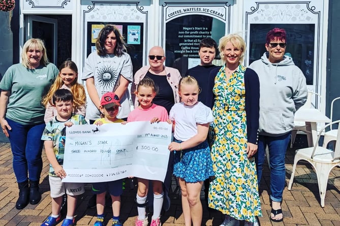 Saturday School students came together to officially hand over the £300 raised for the Megans Starr Foundation in their show at the Torch Theatre earlier this year.