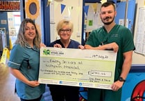 Coastal walk raises over £2,500 for frailty services at Withybush