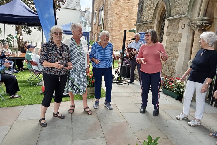 Dancing at the St Johns Teddy Bear picnic afternoon tea party to music played by Billy Cole
