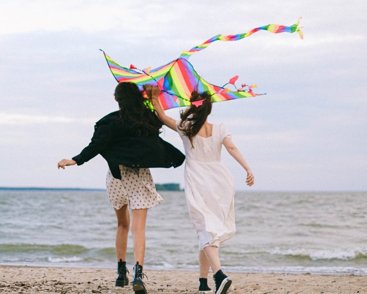 Flying kite over beach