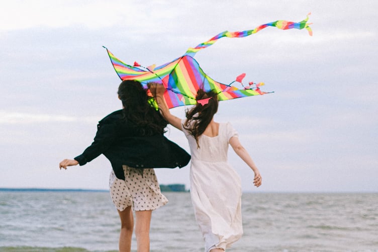 Flying kite over beach
