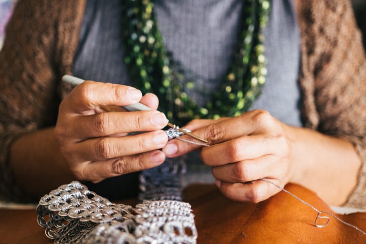 Lady doing crochet