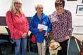 Bowling tour's donation for local branch of Guide Dogs For The Blind