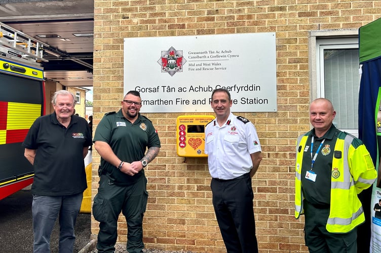 From left to right: Save a Life Cymru Chair Professor Len Nokes, Nick Ozzati from the Welsh Ambulance Service Trust, Chief Fire Officer Roger Thomas and Save a Life Cymru Community Co-ordinator Marc Gower.