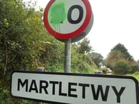 Village residents clean up 20mph speed limit signs after vandalism