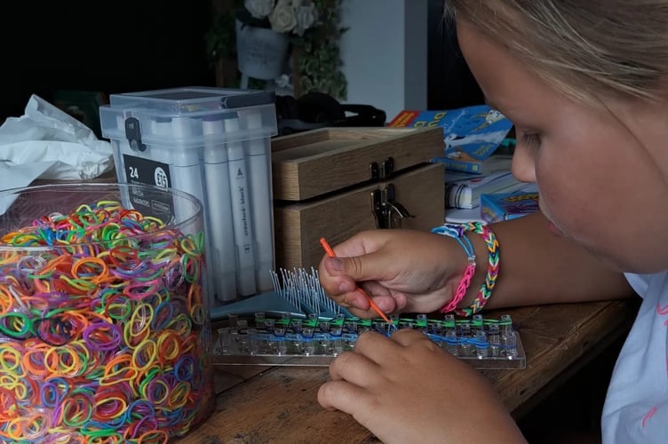 Grace working on bracelets
