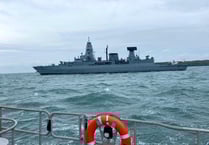 Angle RNLI crew assist with medical evacuation from NATO warship