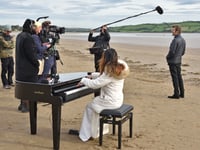 Rhod Gilbert chooses Llansteffan Beach for Stand Up To Cancer filming