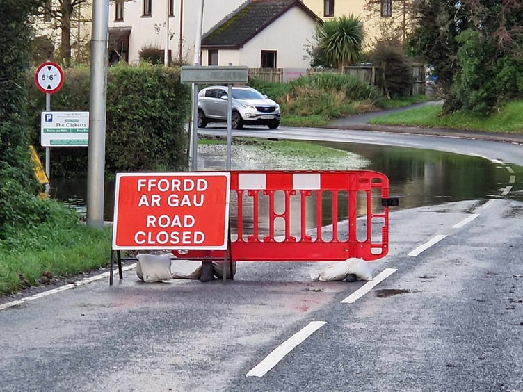Clicketts Lane road closure woing to flooding
